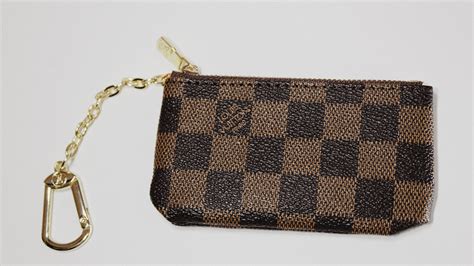 replica louis vuitton change pouch|louis vuitton coin pouch.